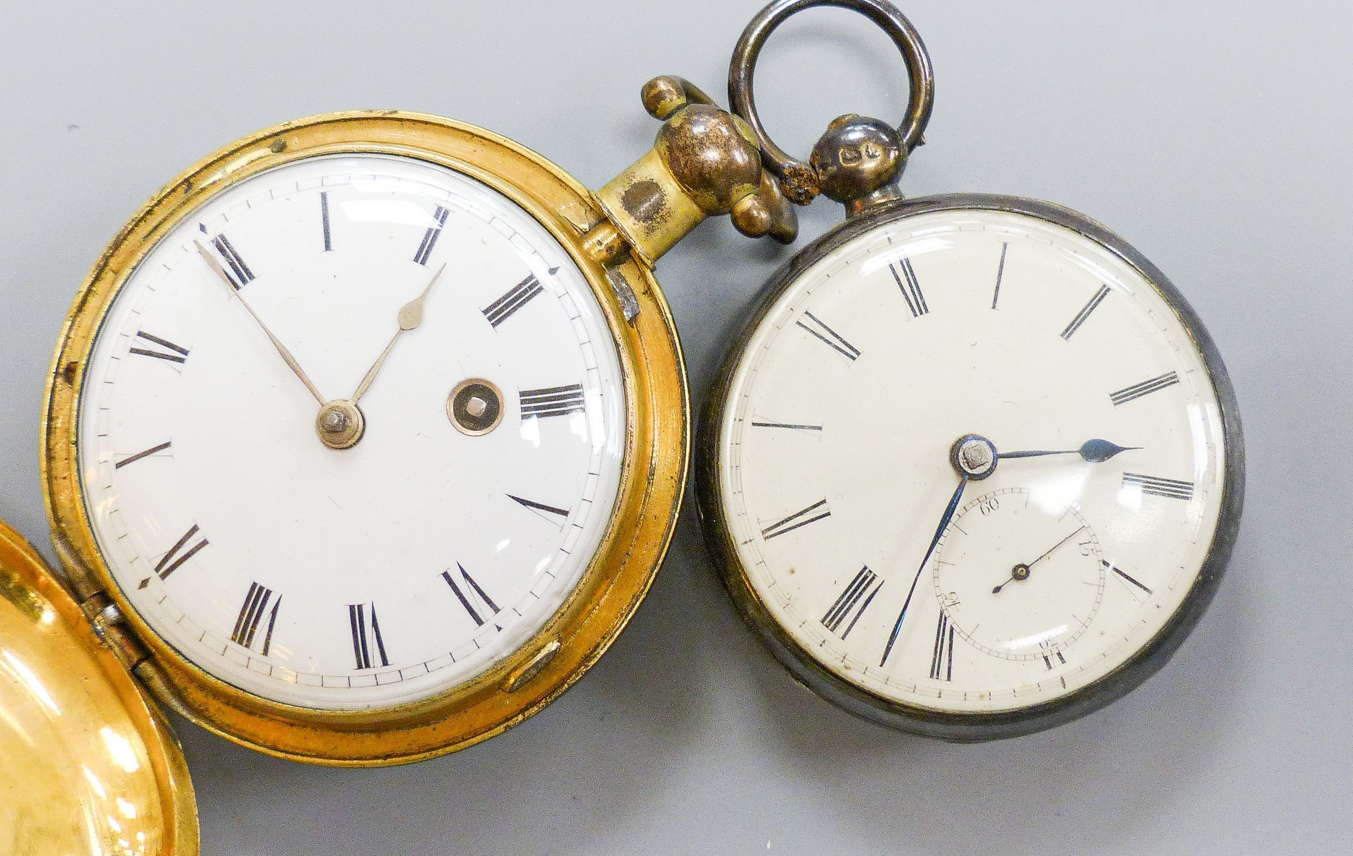 A 19th century engine turned gilt metal hunter verge pocket watch, by Johnson of London, case diameter 52mm, together with a Victorian silver open face pocket watch.